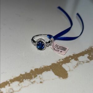 Elegant Silver and Blue Gemstone Ring